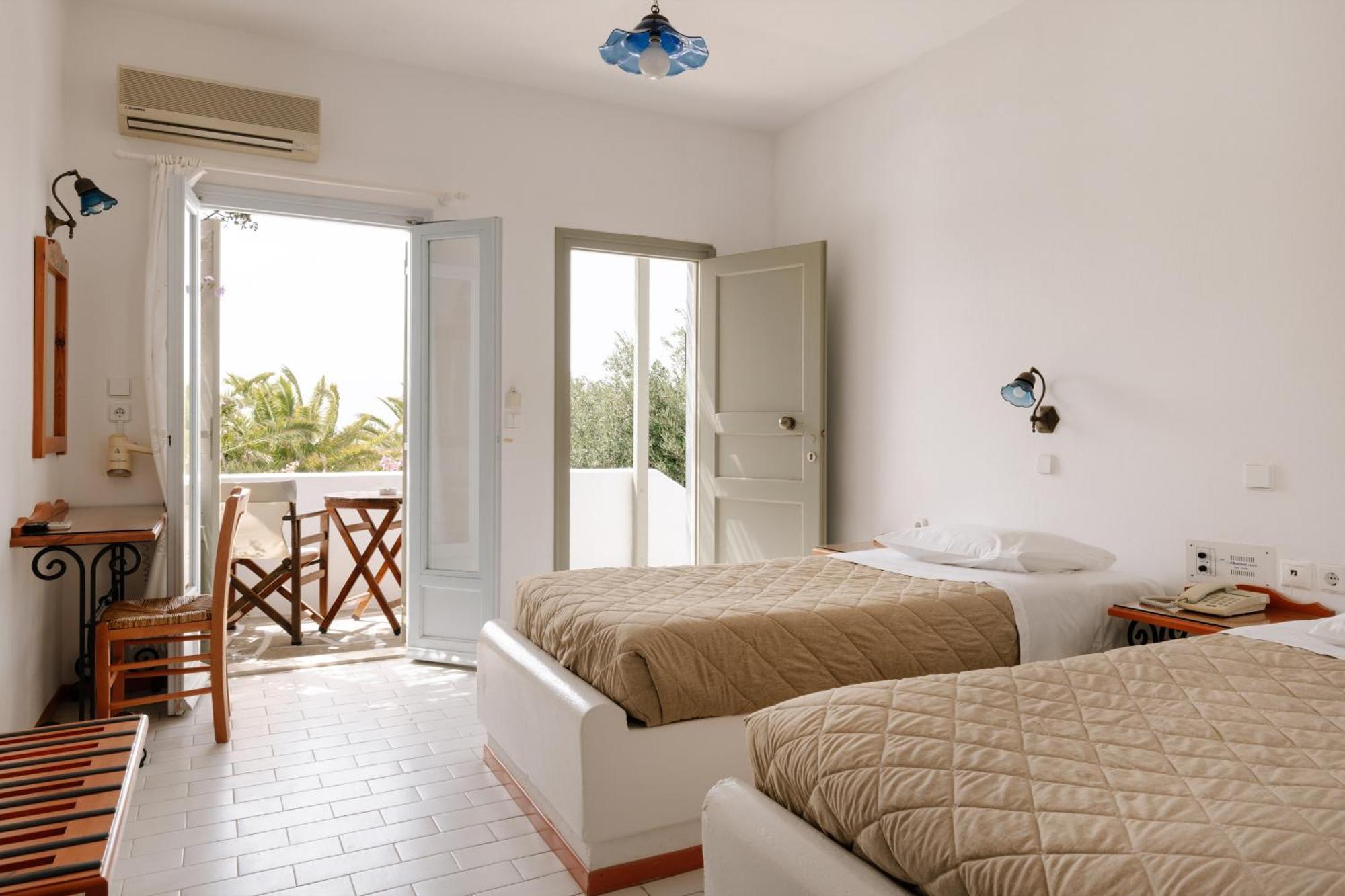 Pnoi Hotel Logaras Rum bild